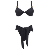 "Madelyn Black Bikini Top and Dylan Bikini Bottom  laid flat, showcasing the twist-front detail and luxurious gold clasps."
