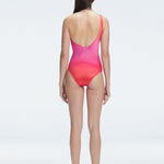 "Model showcasing the back of the Solene Gradient Swimsuit, highlighting the sleek fit and elegant one-shoulder design."
