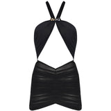 "Carolina Black Swimsuit laid flat, highlighting the halter neck tie, buckle straps, and ruched tulle skirt."
