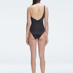 "Model showcasing the back of the Solene Black Swimsuit, highlighting the sleek fit and elegant one-shoulder design."
