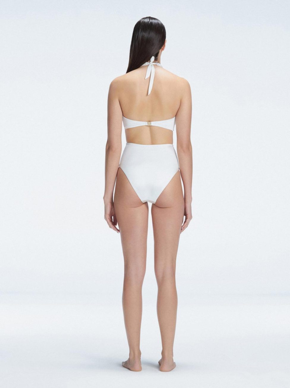 "Back  view of the buckle detailing on the Meredith White Halter Neck Bikini Set, emphasizing the chic, trendy design."

