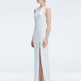 Side view of model showcasing the deep slit and chic buckle on the Louisa White Knitwear Maxi Dress.
