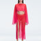 Front view of model wearing Samantha Red Degraded Top with long sleeves and printed mesh fabric.

