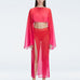 Front view of model wearing Samantha Red Degraded Top with long sleeves and printed mesh fabric.
