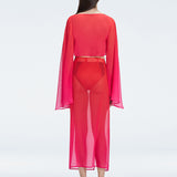 Back view of model wearing Samantha Red Degraded Top, highlighting the sleek fit and long sleeves.
