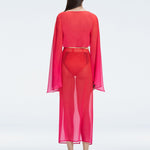 Back view of model wearing Tabitha Red Degraded Skirt, highlighting the hidden zipper and sleek fit.
