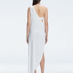 Back view of model wearing Coraline White Dress, featuring a soft draped fit and one-shoulder style.
