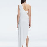 Back view of model wearing Coraline White Dress, featuring a soft draped fit and one-shoulder style.
