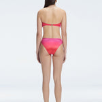 "Model wearing the Ilana Gradient  Bikini Set from the back, showcasing the elegant bandeau design and adjustable straps."

