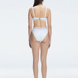 "Model showcasing the back of the Lorelai White  Bikini Top, highlighting the adjustable straps and comfortable fit."
