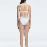 "Model showcasing the back of the Lorelai White Bikini Set , highlighting the comfortable fit and stylish design."
