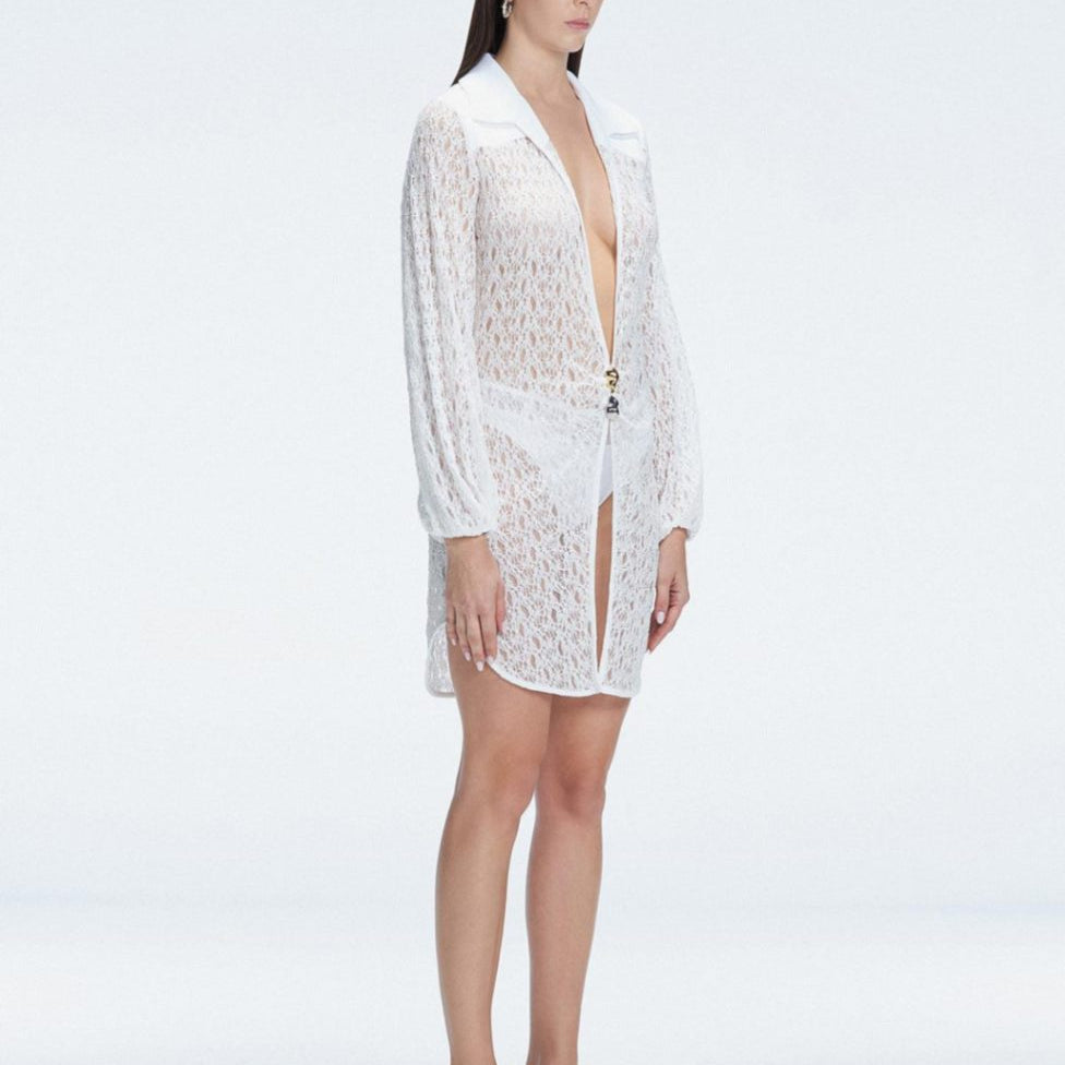Editorial - Althea White Long Sleeve Lace Mini Kaftan | Moeva | Kaftan | Each week unveils new pieces—luxury swimwear, fluid resort silhouettes, and elevated summer-to-evening essentials designed to carry you from coastal escapes to city nights.