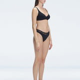 "Side view of the mesh detailing and scoop neck on the Lorelai Black Bikini Top, emphasizing its stylish design."
