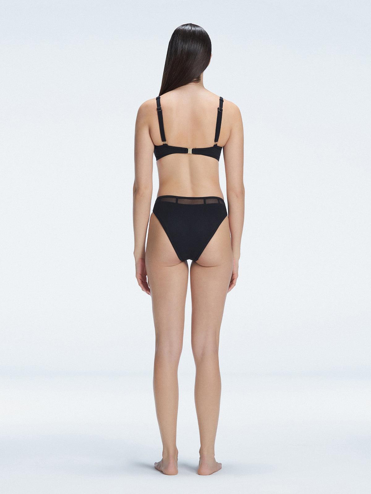 "Model showcasing the back of the Lorelai Black Bikini Top, highlighting the adjustable straps and comfortable fit."
