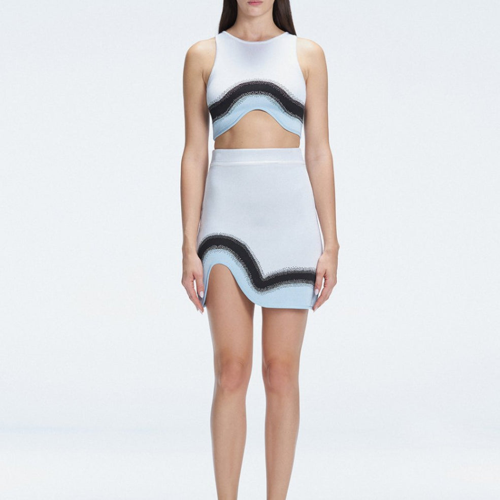 Lydia Blue Optical Knit Mini Skirt | Moeva | Skirt | Each week unveils new pieces—luxury swimwear, fluid resort silhouettes, and elevated summer-to-evening essentials designed to carry you from coastal escapes to city nights.