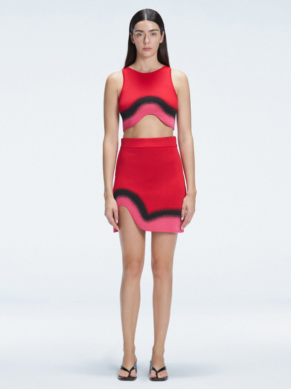 Lydia Red Optical Knit Mini Skirt | Moeva | Skirt | Each week unveils new pieces—luxury swimwear, fluid resort silhouettes, and elevated summer-to-evening essentials designed to carry you from coastal escapes to city nights.