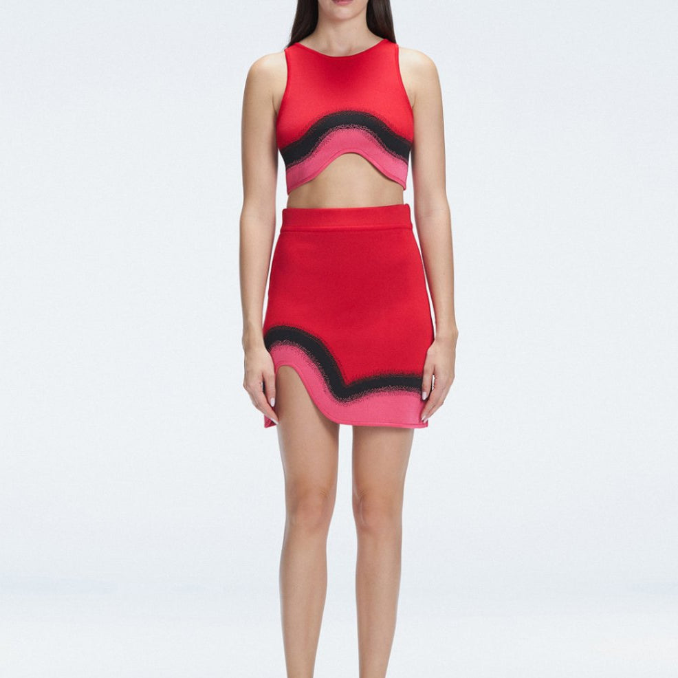 Lydia Red Optical Knit Mini Skirt | Moeva | Skirt | Each week unveils new pieces—luxury swimwear, fluid resort silhouettes, and elevated summer-to-evening essentials designed to carry you from coastal escapes to city nights.