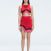 Model showcasing the Cecilia Red Degraded Crop Top and Lydia Skirt Set highlighting its vibrant multicolored pattern.