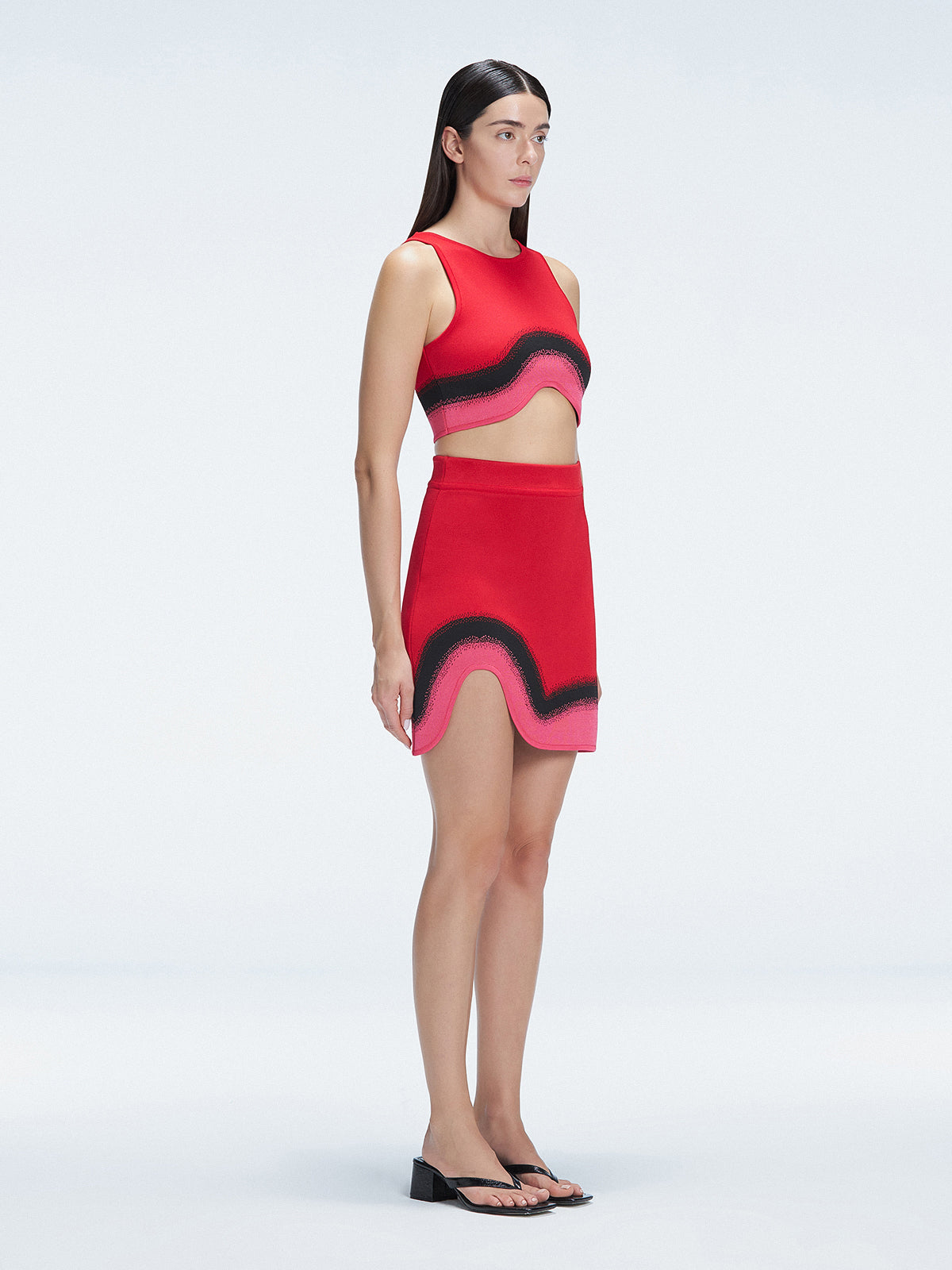 Side view of the Cecilia Red Degraded Crop Top, showcasing its sleeveless design and stylish silhouette.