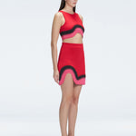 Side view of the Lydia Red Degraded Skirt, emphasizing its unique asymmetrical shape