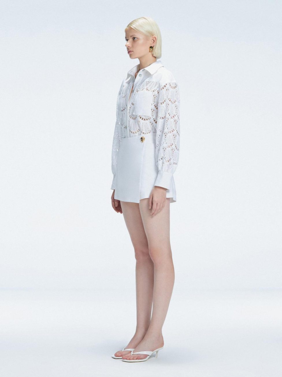 Nola White Long Sleeve Cotton Shirt and Elise White Linen Mini Skort Set | Moeva | Set | Each week unveils new pieces—luxury swimwear, fluid resort silhouettes, and elevated summer-to-evening essentials designed to carry you from coastal escapes to city nights.