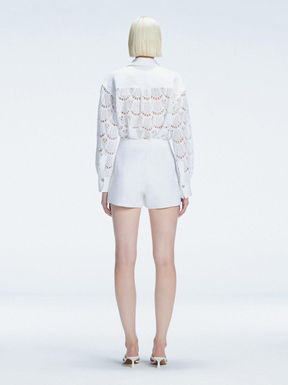 Nola White Long Sleeve Cotton Shirt and Elise White Linen Mini Skort Set | Moeva | Set | Each week unveils new pieces—luxury swimwear, fluid resort silhouettes, and elevated summer-to-evening essentials designed to carry you from coastal escapes to city nights.