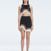 Model showcasing the Lydia Black Degraded Skirt, highlighting its stylish asymmetrical design.