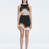 Model showcasing the Lydia Black Degraded Skirt, highlighting its stylish asymmetrical design.