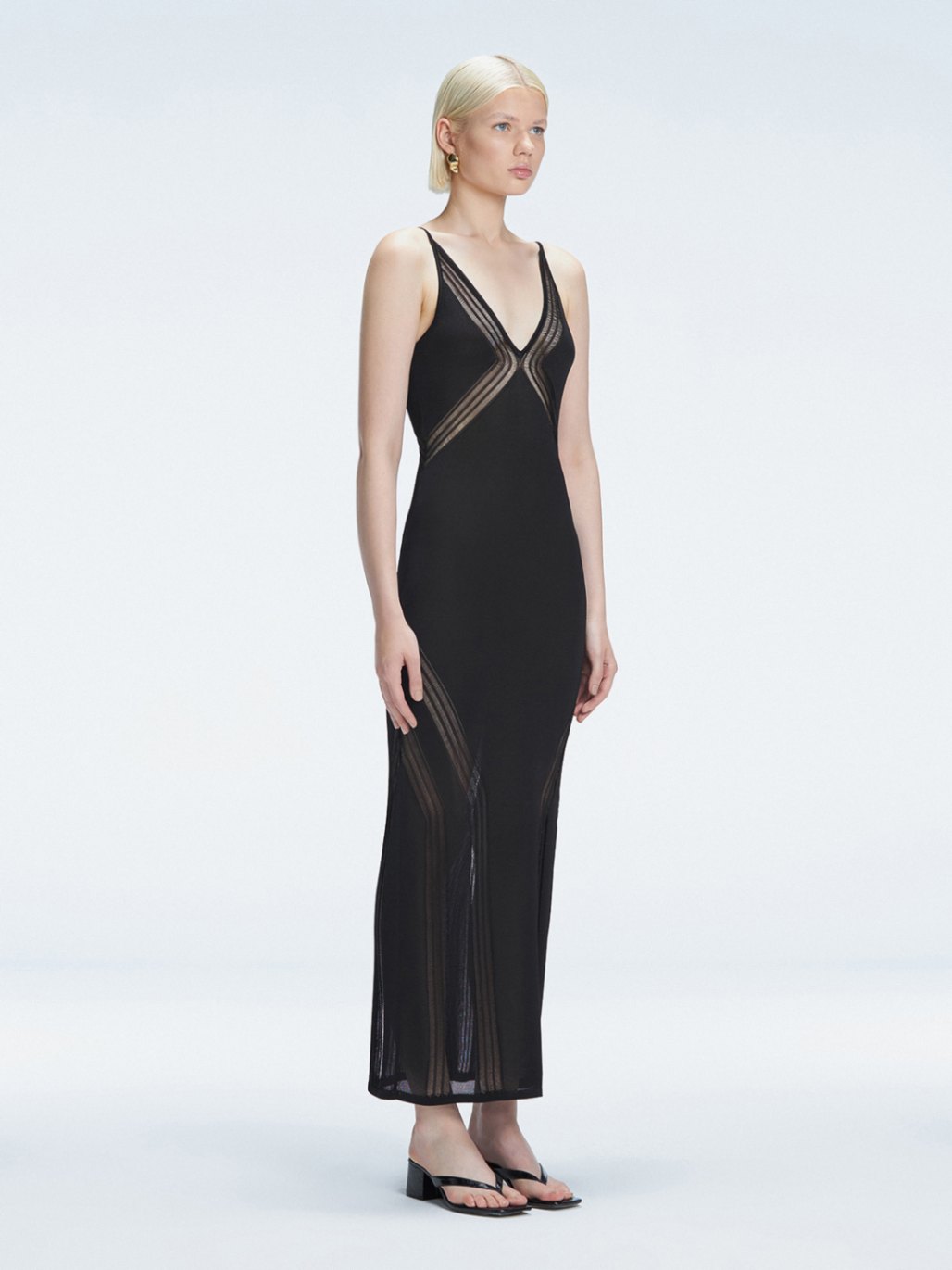 Chiara King - Odessa Black V Neck Knit Maxi Dress | Moeva | Dress | Each week unveils new pieces—luxury swimwear, fluid resort silhouettes, and elevated summer-to-evening essentials designed to carry you from coastal escapes to city nights.
