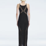 Back view of the Odessa Black Reversible Dress, illustrating its sleek and sophisticated silhouette.