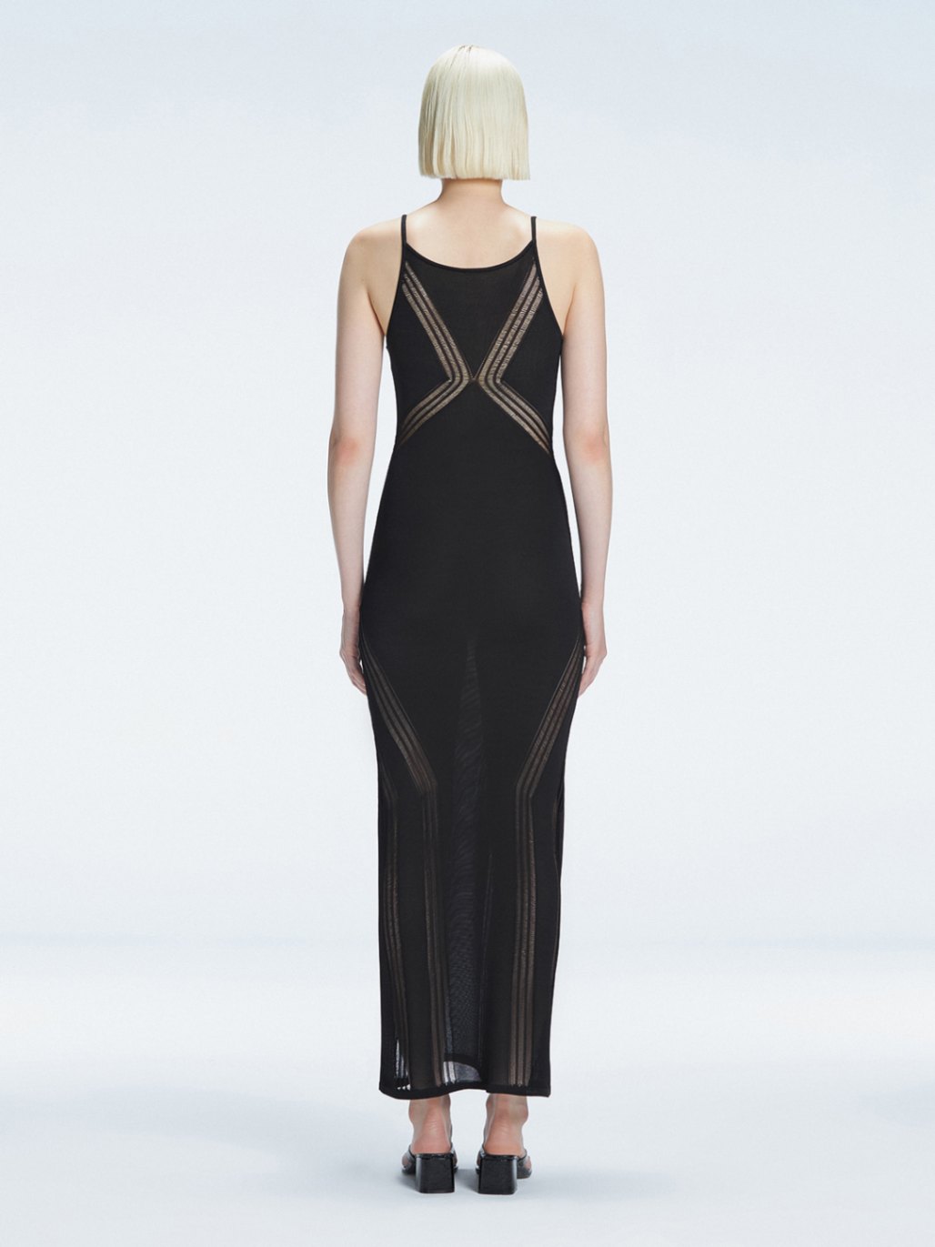 Odessa Black V Neck Knit Maxi Dress | Moeva | Dress | Each week unveils new pieces—luxury swimwear, fluid resort silhouettes, and elevated summer-to-evening essentials designed to carry you from coastal escapes to city nights.