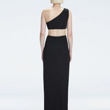 Back view of model wearing Violet Black Maxi Dress, highlighting the one-shoulder design and sleek fit.
