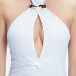 Close-up of the twist-front design and gold accessory on the Rosamund White One Piece swimsuit.
