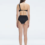 "Model showing the back of the Romina Black Bikini Set , highlighting the high-waist fit and sleek design."
