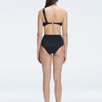 "Model showing the back of the Romina Black Bikini Bottom, highlighting the high-waist fit and sleek design."
