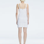 Back view of model wearing Heather White Dress, highlighting the sleek silhouette and adjustable straps.
