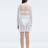 Back view of model wearing Chantel White Kaftan, highlighting the lightweight mesh knit fabric and loose fit.
