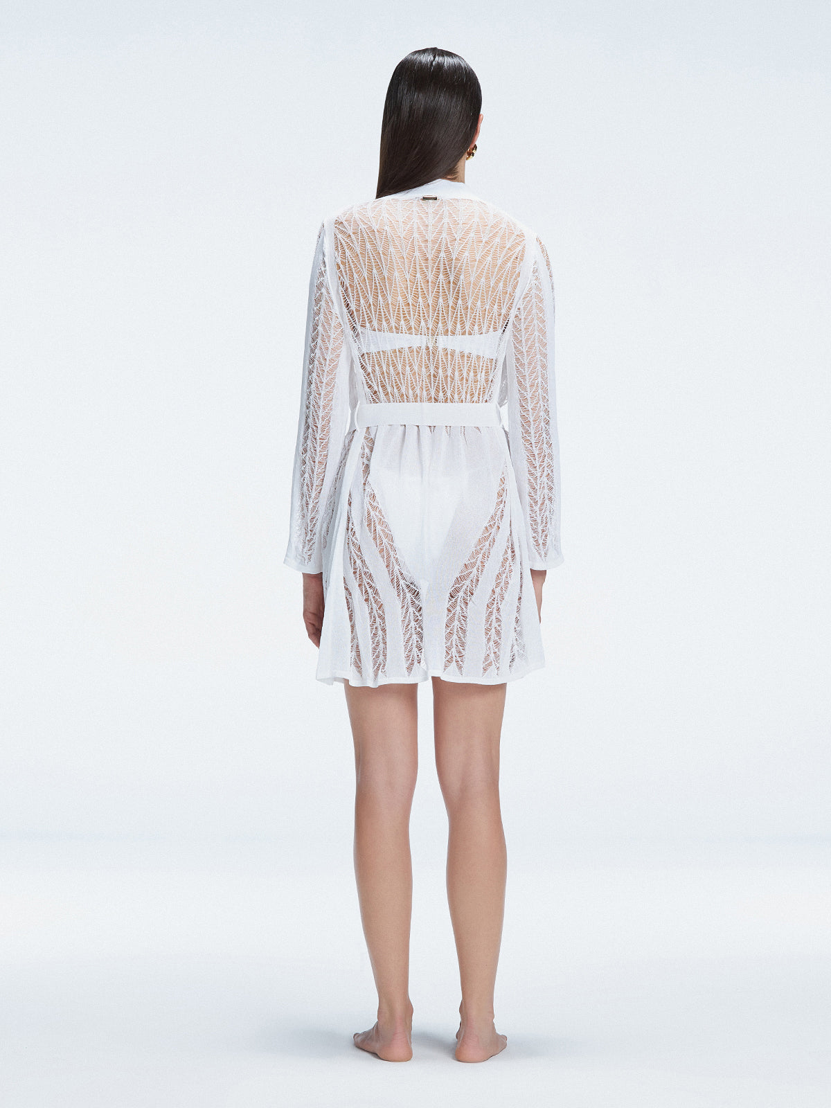 Back view of model wearing Chantel White Kaftan, highlighting the lightweight mesh knit fabric and loose fit.
