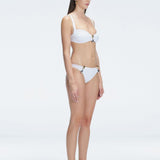 Side view of the Emilia White Bikini Set , featuring moderate coverage and fully lined Italian fabric.
