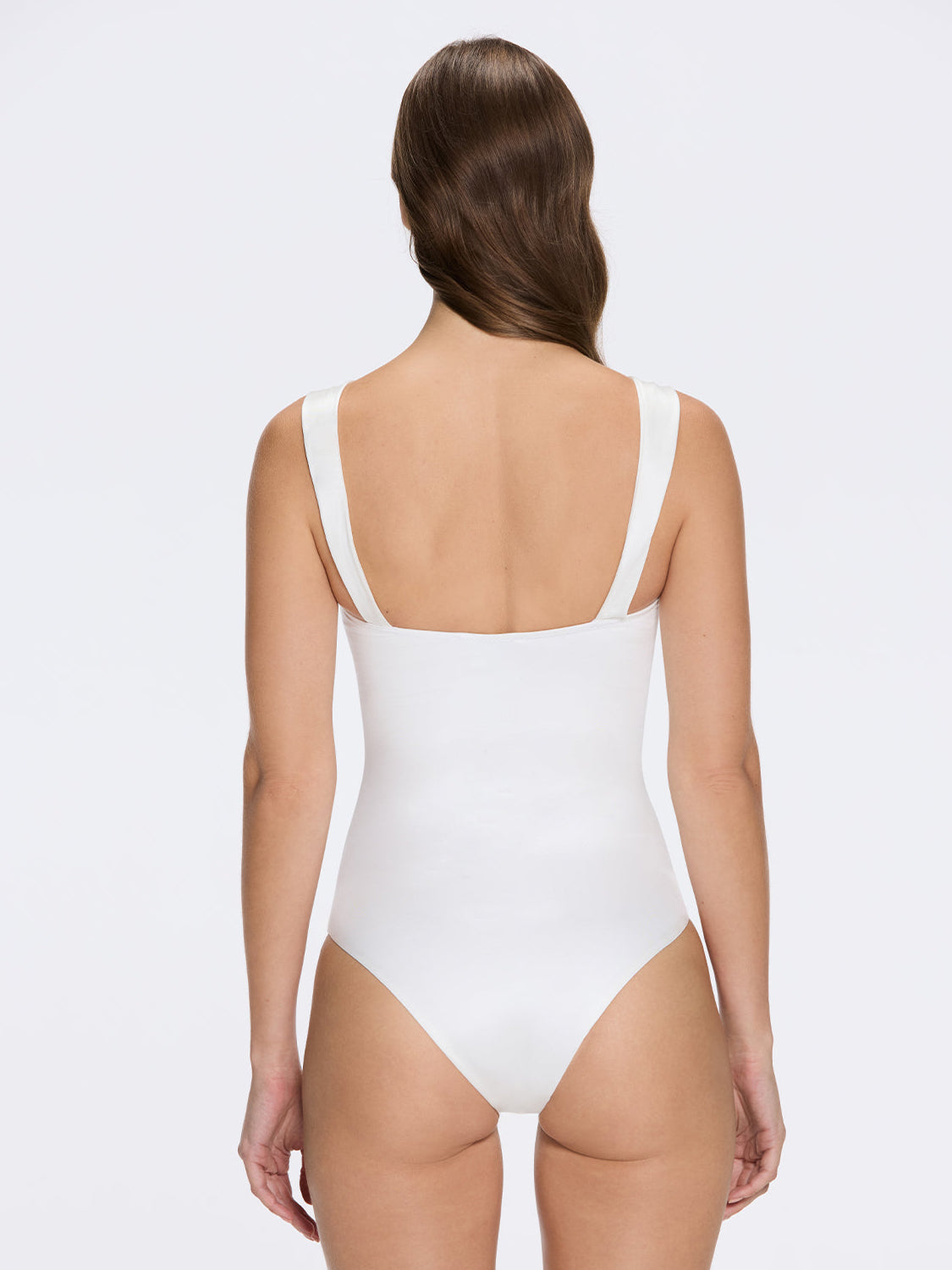 Talia V Neck with Gold Detail Satin White Swimsuit | Moeva | Swimsuit | Each week unveils new pieces—luxury swimwear, fluid resort silhouettes, and elevated summer-to-evening essentials designed to carry you from coastal escapes to city nights.