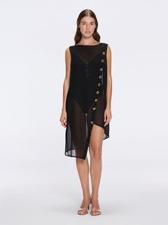 Solianne Black Sheer Sleeveless Asymmetric Dress with Gold Button Detail | Moeva | Beachwear Dresses | Each week unveils new pieces—luxury swimwear, fluid resort silhouettes, and elevated summer-to-evening essentials designed to carry you from coastal escapes to city nights.