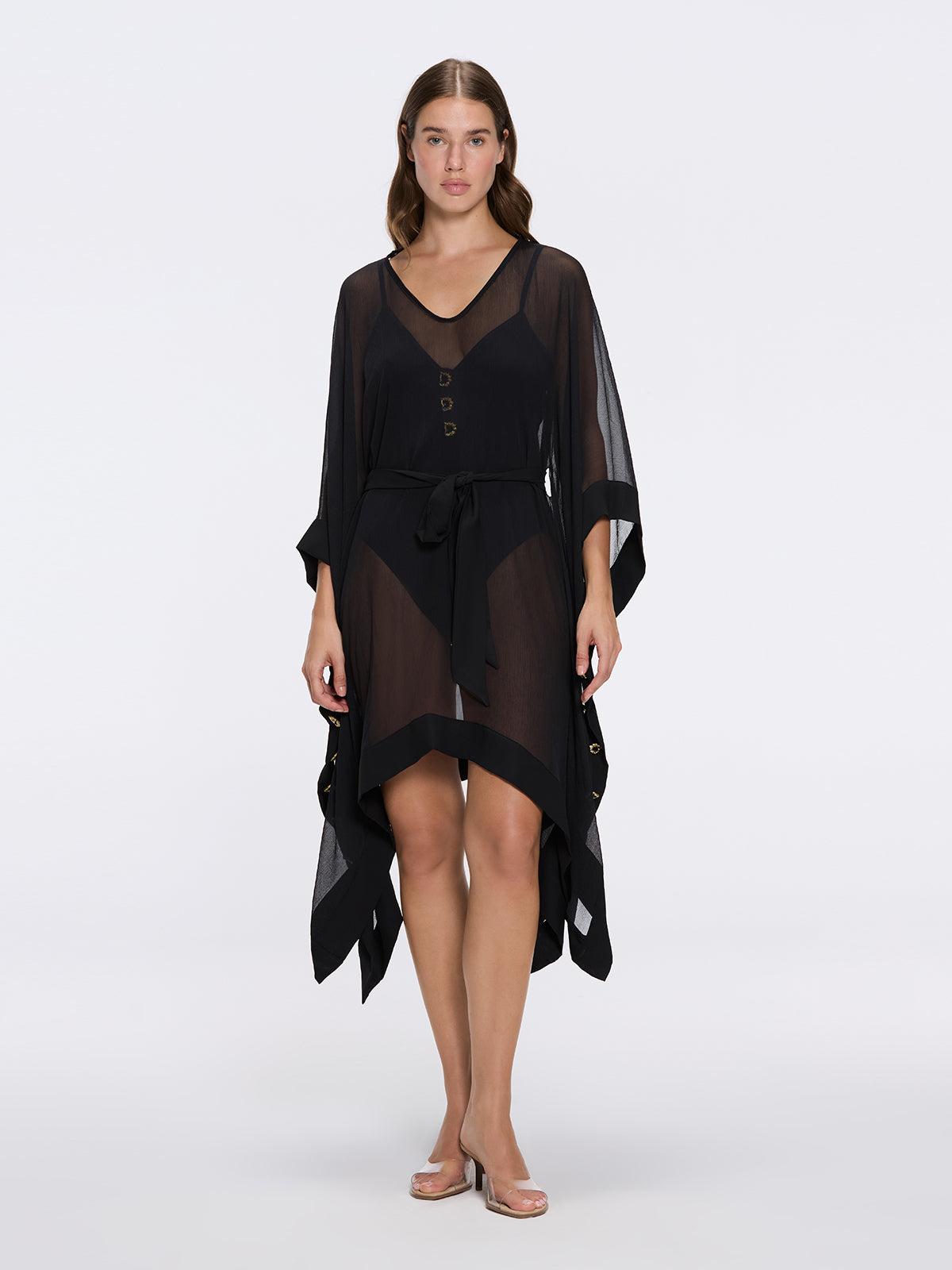 Tata Black Sheer Gold Buttoned Belted Kaftan with Asymmetric Hem | Moeva | Kaftan | Each week unveils new pieces—luxury swimwear, fluid resort silhouettes, and elevated summer-to-evening essentials designed to carry you from coastal escapes to city nights.