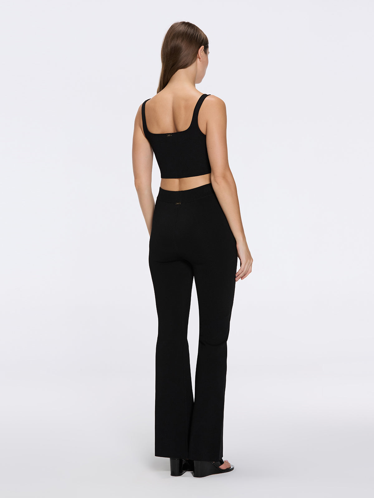 Colette Black Knitted Black High Waisted Wide-Leg Pants | Moeva | Pants | Each week unveils new pieces—luxury swimwear, fluid resort silhouettes, and elevated summer-to-evening essentials designed to carry you from coastal escapes to city nights.