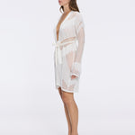 Kenga Knitted Knee-Length Long-Sleeve Belted White Kaftan | Moeva | Kaftans | Each week unveils new pieces—luxury swimwear, fluid resort silhouettes, and elevated summer-to-evening essentials designed to carry you from coastal escapes to city nights.