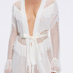 Kenga Knitted Knee-Length Long-Sleeve Belted White Kaftan | Moeva | Kaftans | Each week unveils new pieces—luxury swimwear, fluid resort silhouettes, and elevated summer-to-evening essentials designed to carry you from coastal escapes to city nights.