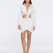 Greta White Satin Long Sleeve Tie Front Shirt | Moeva | Beachwear Tops | Each week unveils new pieces—luxury swimwear, fluid resort silhouettes, and elevated summer-to-evening essentials designed to carry you from coastal escapes to city nights.