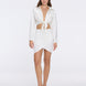 Greta White Satin Long Sleeve Tie Front Shirt | Moeva | Beachwear Tops | Each week unveils new pieces—luxury swimwear, fluid resort silhouettes, and elevated summer-to-evening essentials designed to carry you from coastal escapes to city nights.