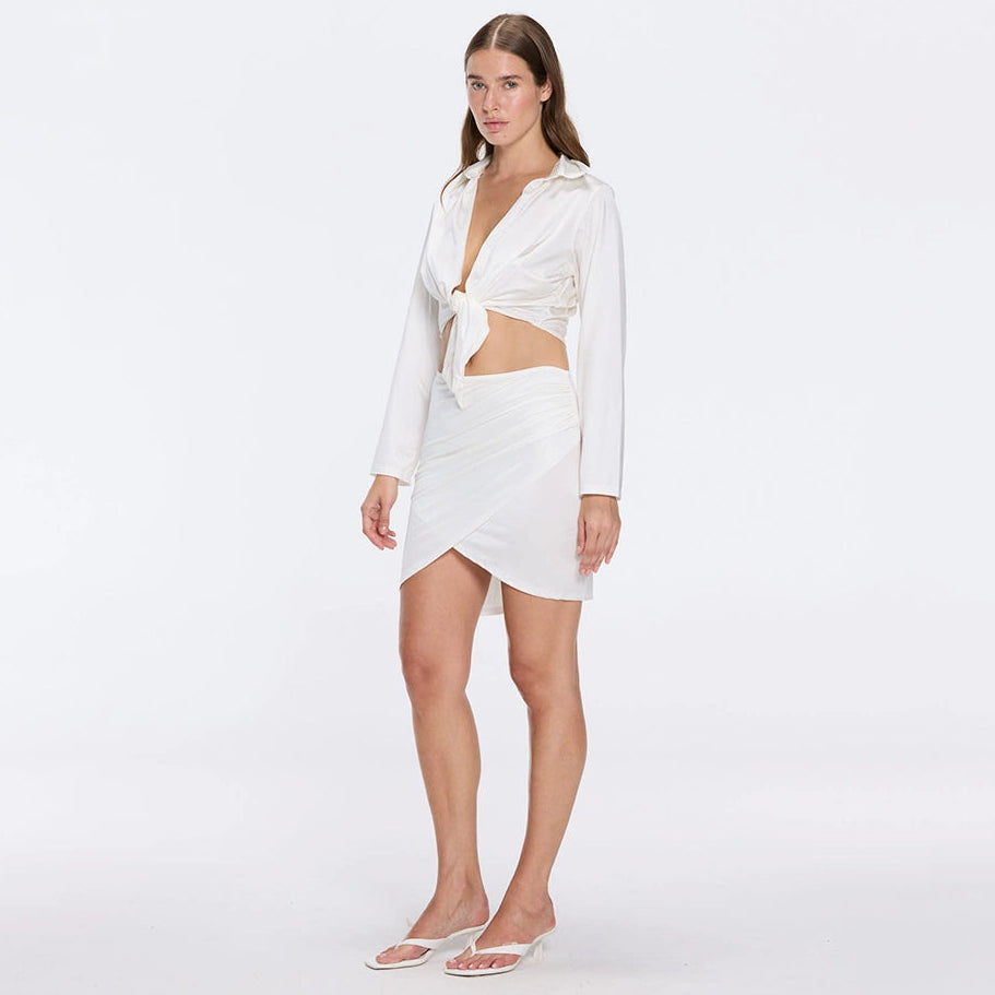 Antonia White Satin High-Waist Wrap Mini Skirt | Moeva | Skirt | Each week unveils new pieces—luxury swimwear, fluid resort silhouettes, and elevated summer-to-evening essentials designed to carry you from coastal escapes to city nights.