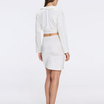 Greta White Satin Tie Front Shirt And Antonia Skirt Set | Moeva | Beachwear Tops | Each week unveils new pieces—luxury swimwear, fluid resort silhouettes, and elevated summer-to-evening essentials designed to carry you from coastal escapes to city nights.