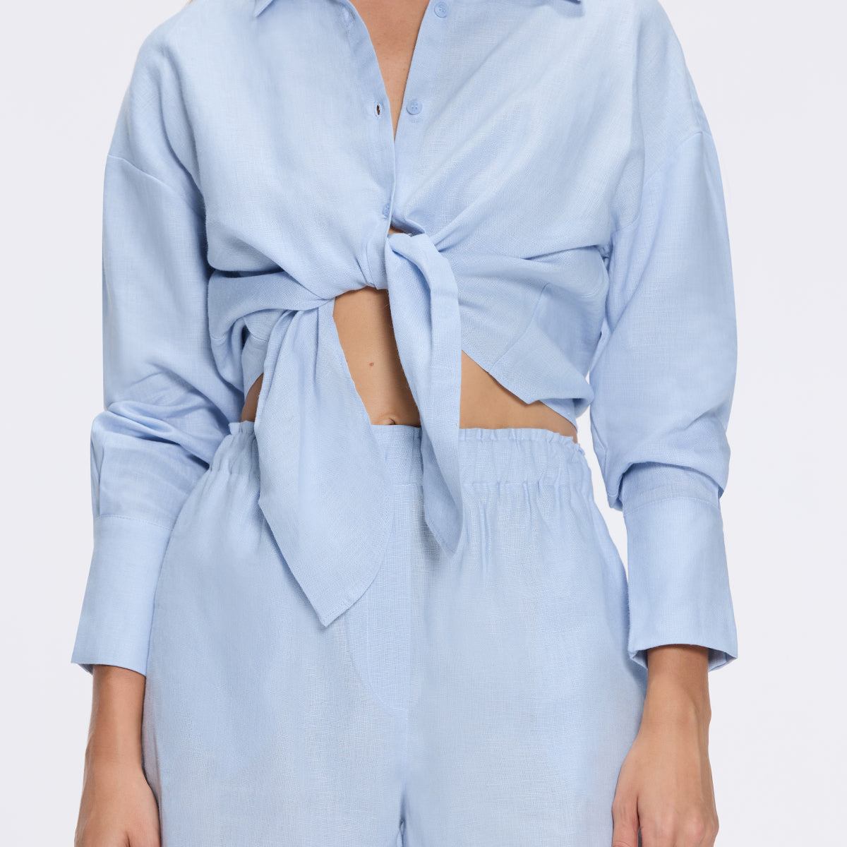 Hanson Blue Long Sleeve Linen Tie Front Shirt | Moeva | Shirt | Each week unveils new pieces—luxury swimwear, fluid resort silhouettes, and elevated summer-to-evening essentials designed to carry you from coastal escapes to city nights.